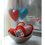 felt holiday hearts ornaments by Constanca Cabral in Fa La La Felt, 2010