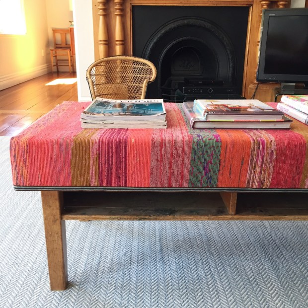 coffee table upholstered with a recycled sari woven rug